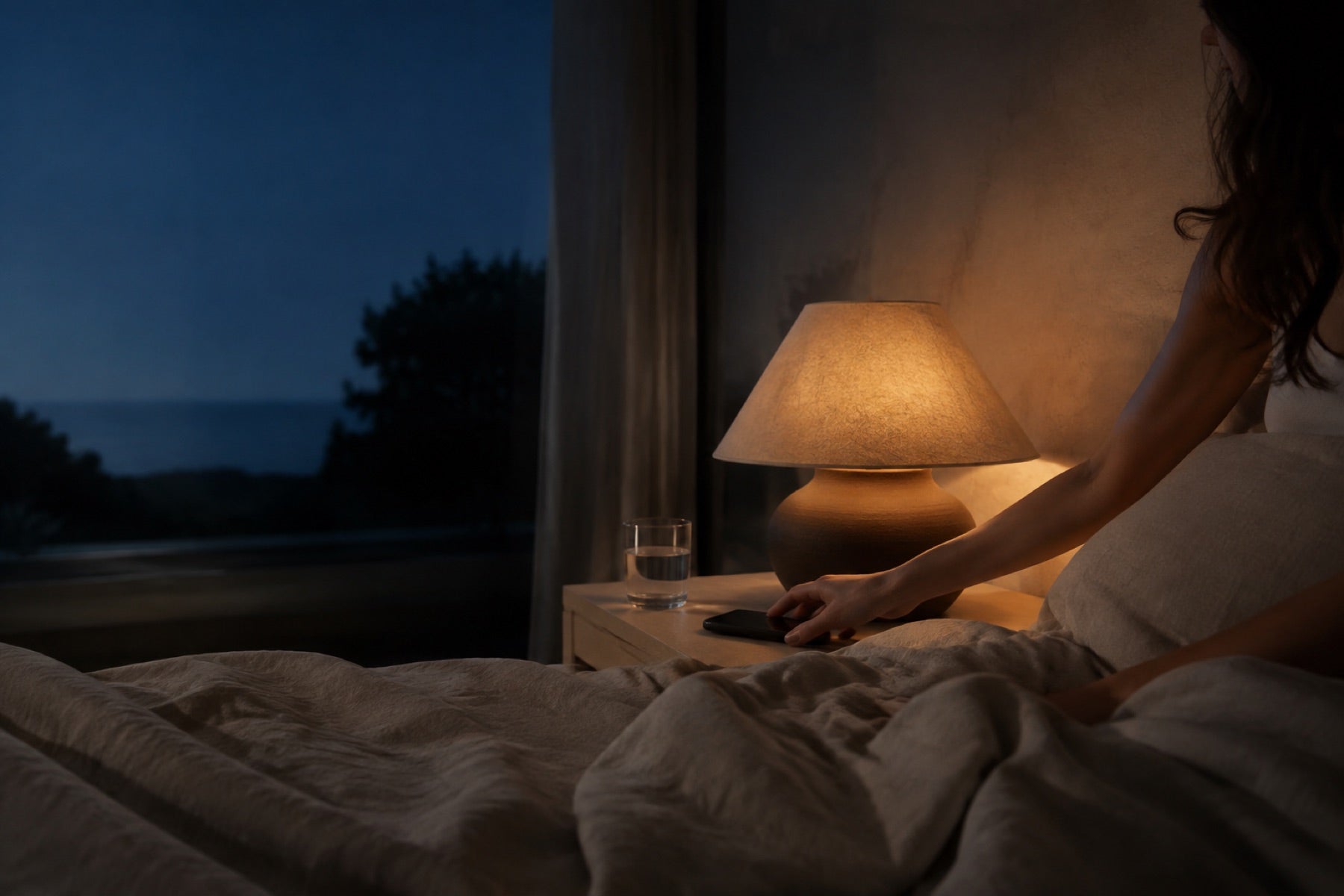A quiet evening ritual in deep dusk light.